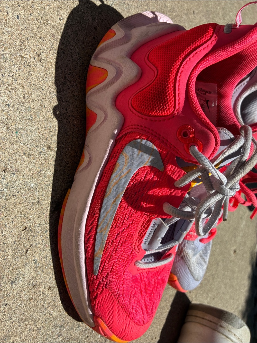 Nike Hot Pink and Silver Running Shoes with Orange Accents